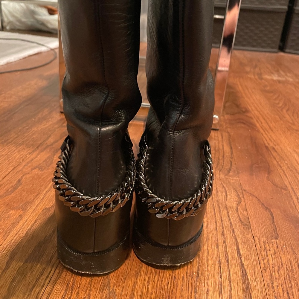 Christian Louboutin knee high chain boots